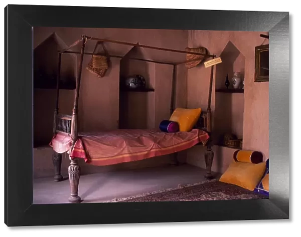 A four-poster bed in a girls bedroom in Nakhl