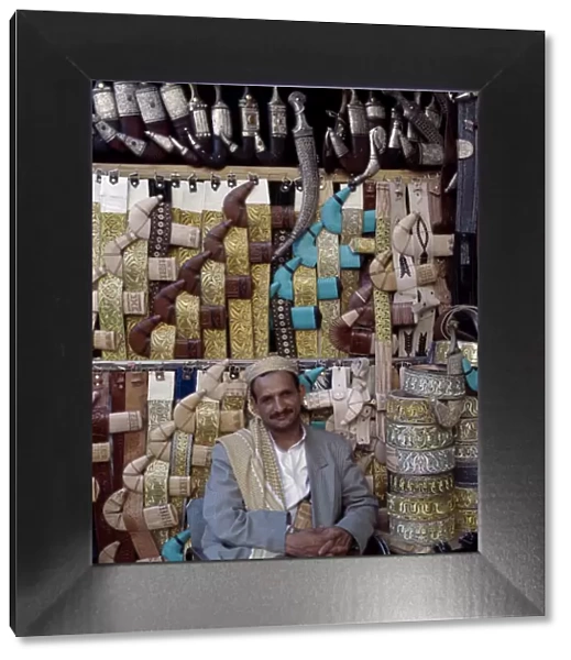 Yemeni trader sells traditional daggers at his stall