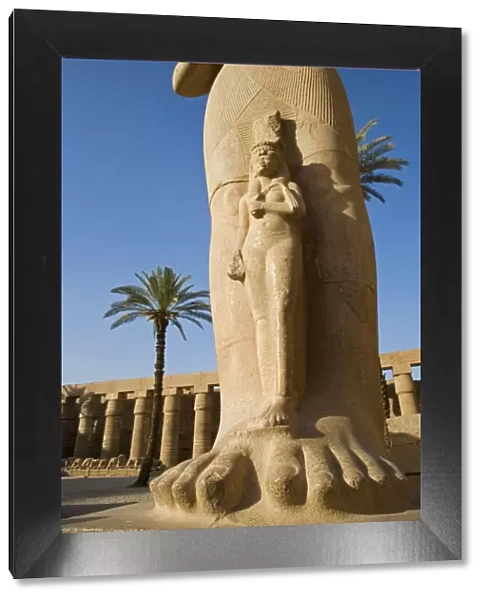 A colossal statue of Ramses II with his daughter Benta-anta