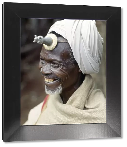 A Konso man wears a phallic Kallaacha on his forehead