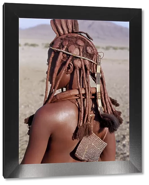 A Himba woman in traditional attire