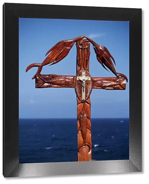 Wooden cross on erected on the southern coast combining