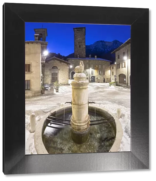 Twilight in the main square of Gromo, Val Seriana, Bergamo province, Lombardy, Italy