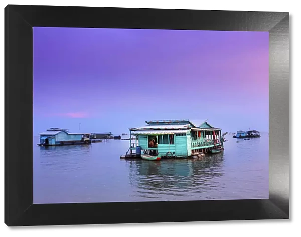Southeast Asia, Cambodia, floating houses on Tonle Sap lake at sunset