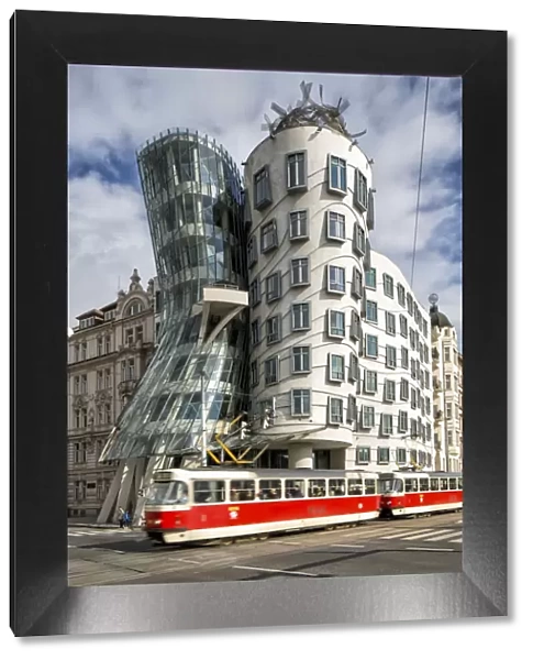 Czech Republic, Prague, A tram crossing in front of the modern building called Tancici