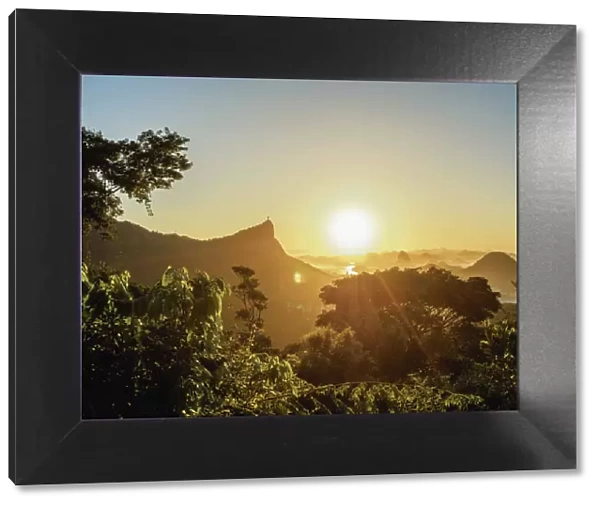 View from Vista Chinesa over Tijuca Forest towards Rio de Janeiro at sunrise, Brazil