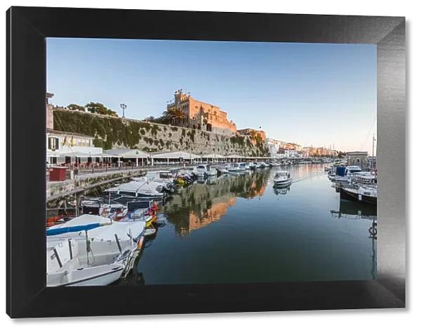 Historic harbour waterfront and town hall at sunset, Ciutadella, Menorca, Balearic