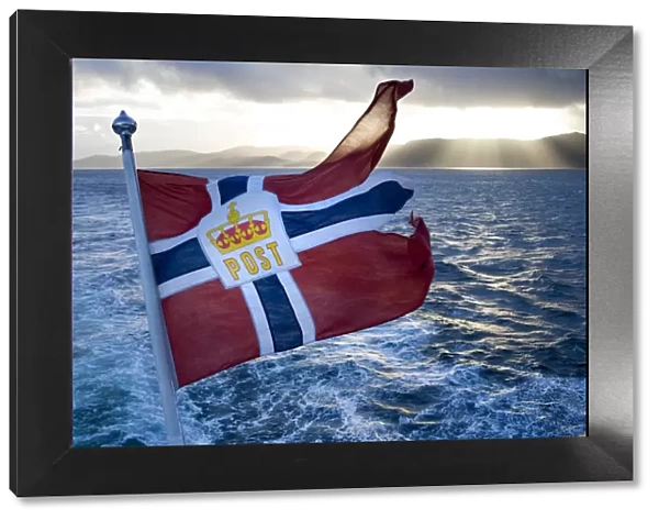 Norwegian flag, on the Hurtigruten coastal express, Northern Norway