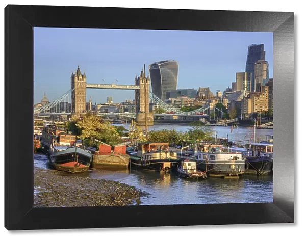 UK, England, London, Tower Bridge over River Thames, City of London skyline