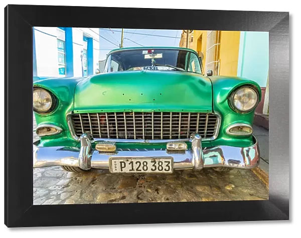 A classic car parked in a street in Trinidad, Sancti Spiritus, Cuba