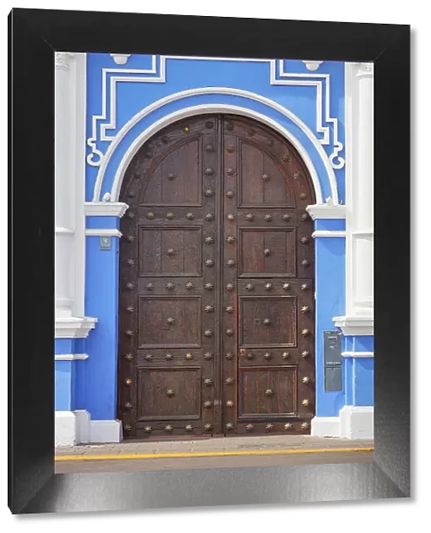 Colonial style door in the 'Plaza de Armas'of Trujillo, La Libertad, Peru