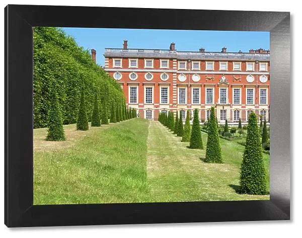 Hampton Court Palace south front, built by Christopher Wren for William III and Mary II, viewed from the Privy Garden, London, England