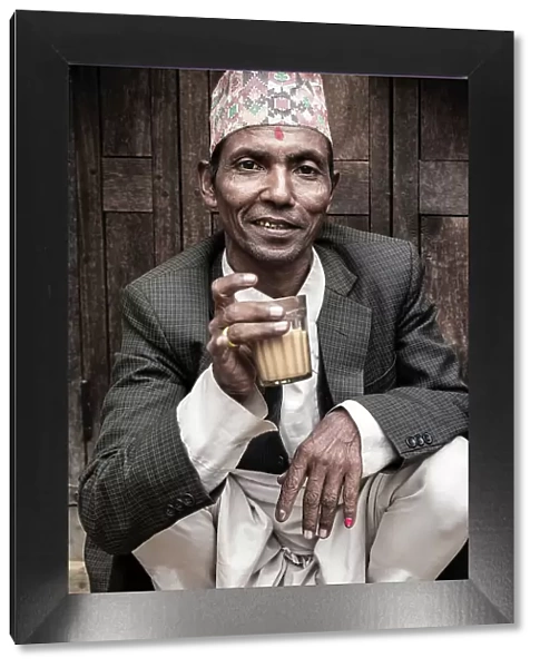 Man drinking tea at Asan Bazaar, Kathmandu, Nepal
