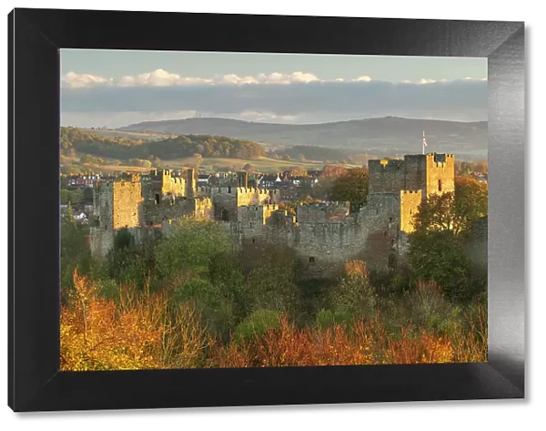 Ludlow Castle at dawn on a sunny autumnal morning, Ludlow, Shropshire, England. Autumn (November) 2022