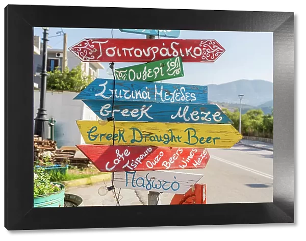 Colourful food signage, Argostoli, Kefalonia, Ionian Islands, Greek Islands, Greece