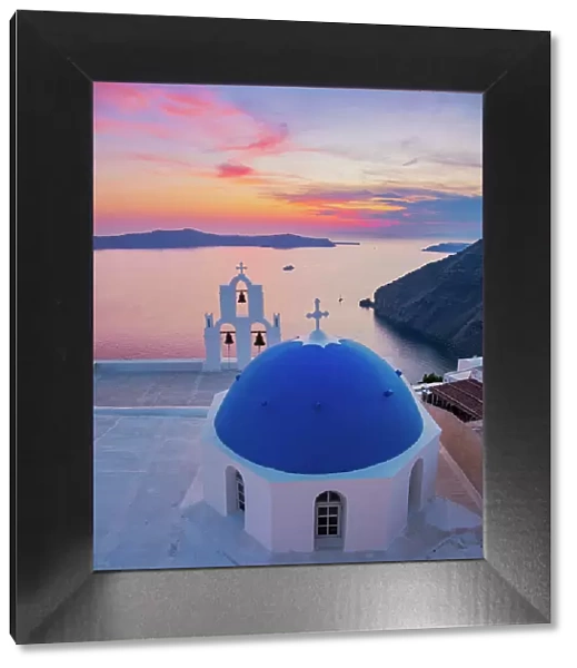 Three Bells of Fira, iconic blue domed church at sunset, Fira, Santorini or Thira Island, Cyclades, Greece