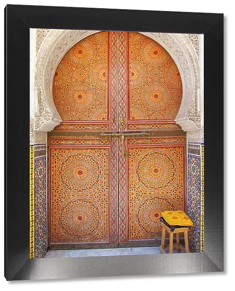 A decorated door in the Medina of Fez, Morocco. The medina of Fes was declared UNESCO World Heritage Site in 1981