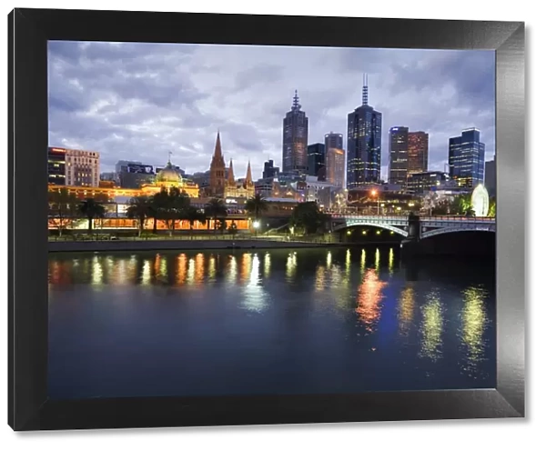 Australia, Victoria, Melbourne. Yarra River and city skyline by night