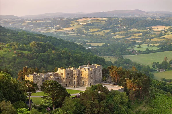 Aerial view of Castle Drogo at dawn on a summer morning, Dartmoor National Park, Devon, England. Spring (June) 2023