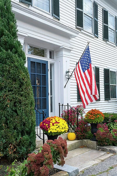 American Flag outside house in Bath, Maine, USA