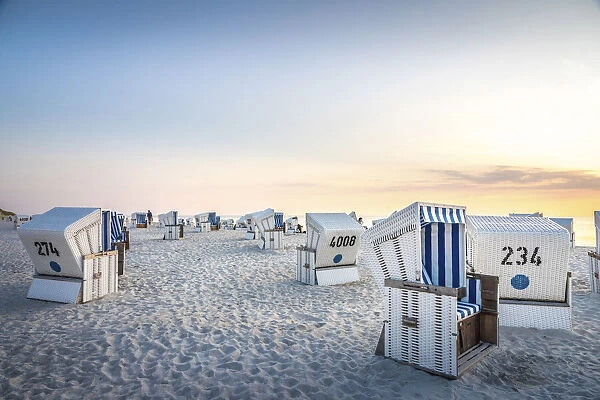 Beach chairs on the Red cliff in Kampen at sunset, Sylt, Schleswig-Holstein, Germany