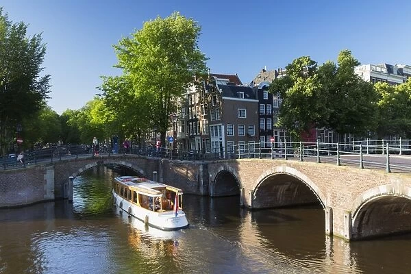 Boat on Prinsengracht canal, Amsterdam, Netherlands