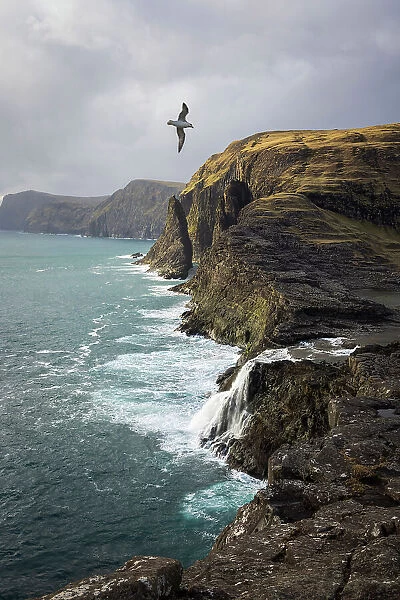Bosdalafossur is a 30m high waterfall falling into the Atlantic Ocean. It's located at the end of Leitisvatn Lake. Island of Vagar. Faroe Islands