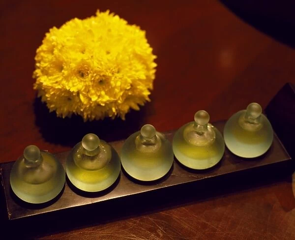 Bottles of scented oils in the spa of the