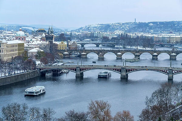 Bridges over Vltava river against sky seen from Letna park in winter, Prague, Bohemia, Czech Republic