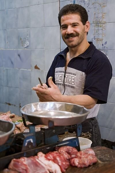 A butcher in the souq, Aleppo, Syria