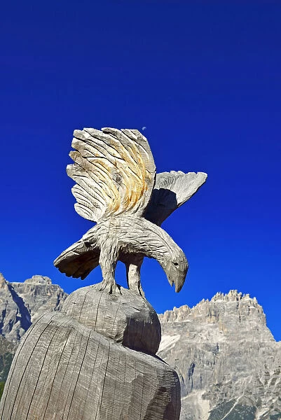 Carved eagle on the Rotwandwiesen before Dreischusterspitze, Alta Pusteria, Sexten