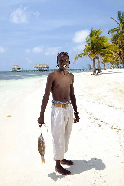 Central America, Belize, Ambergris Caye, San Pedro, a local fisherman on the beach