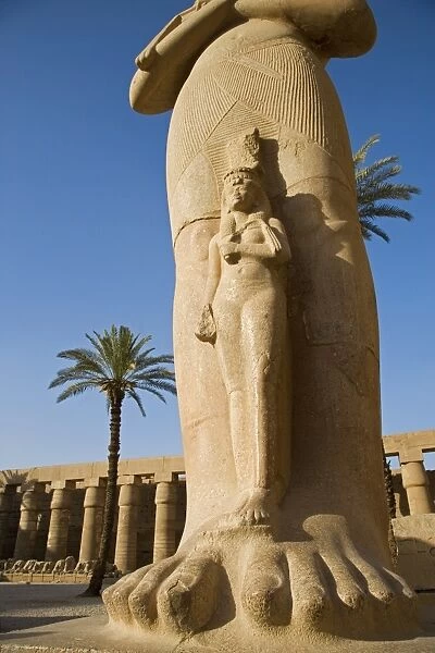 A colossal statue of Ramses II with his daughter Benta-anta