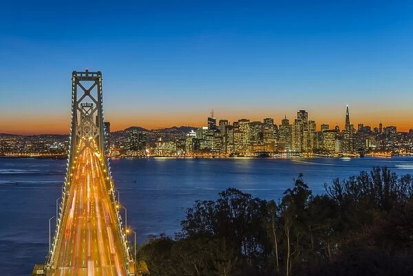 Dusk view over Bay Bridge and downtown skyline from Yerba Buena Island, San Francisco