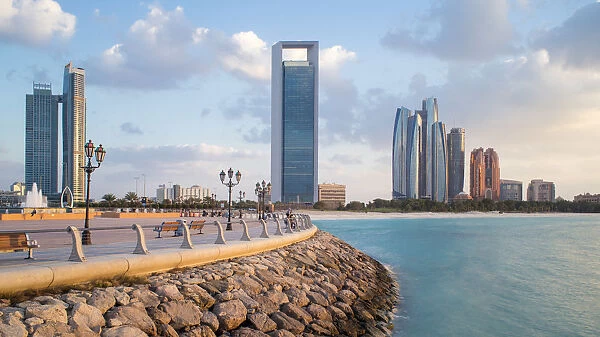 Etihad Towers and Emirates Palace hotel viewed from the Breakwater, Abu Dhabi, United