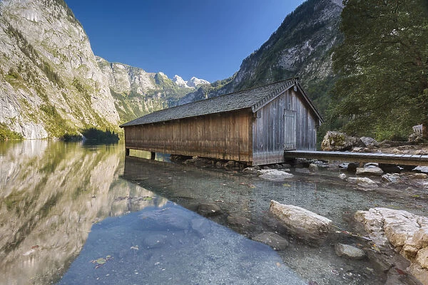 Europe, Germany, Bavaria, Berchtesgaden. Boat dock hangar on Obersee alpine lake in