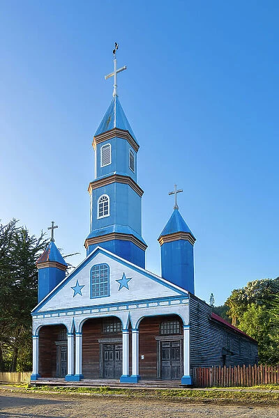 Facade of blue Iglesia Patrimonial Nuestra Senora del Patrocinio Church, Tenaun, Dalcahue, UNESCO, Chiloe Island, Chiloe Province, Los Lagos Region, Chile