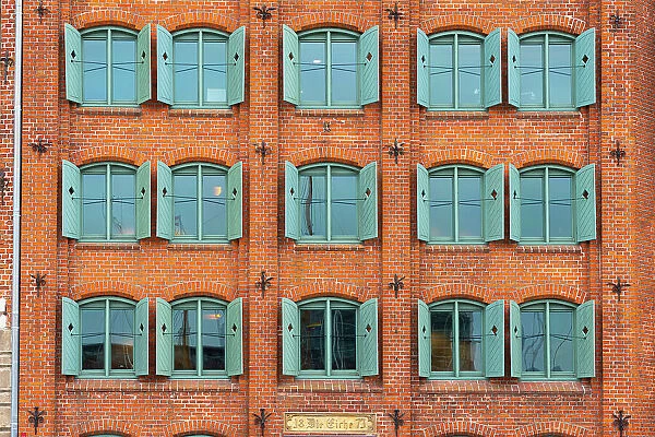 Detail of facade with opened window shutters, Lubeck, UNESCO, Schleswig-Holstein, Germany