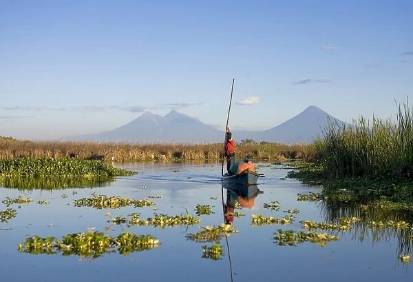 Fisherman, Agua and Pacaya Volcanoes in the background