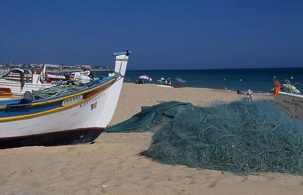 Fishing boats and nets on the beach