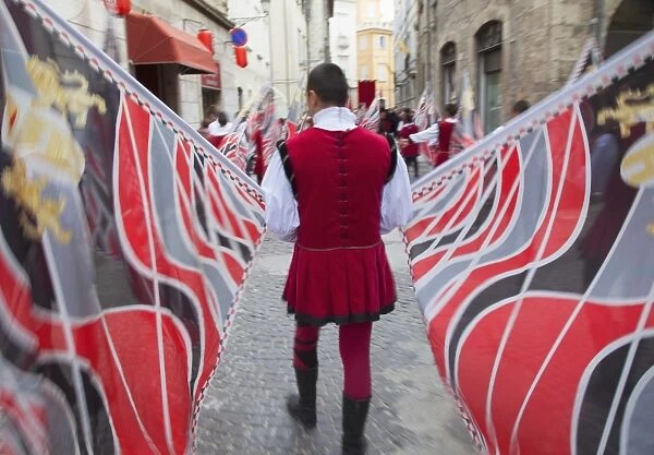 Flag bearer in medieval festival of La Quintana, Ascoli Piceno, Le Marche, Italy