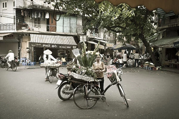 Flower seller in the Old Quarter, Hanoi, Vietnam