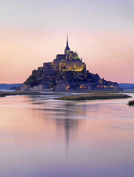 France, Normandy, Le Mont Saint Michel reflected in river at night