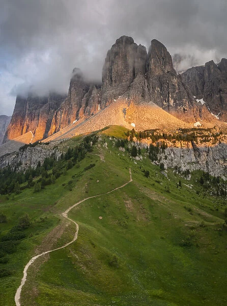 Gardena Pass at sunset after a storm. Dolomites, South Tyrol, Bolzano district, Italy