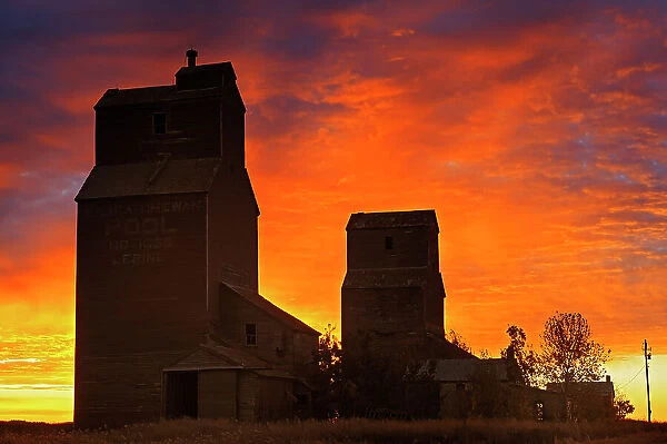 Grain elevators in ghost town at sunrise Lepine, Saskatchewan, Canada