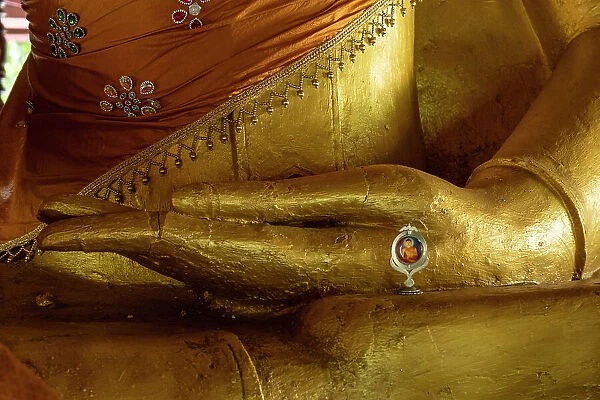 Detail of hand of a Buddha statue, Wat Pak Khan Khammungkhun, Luang Prabang (ancient capital of Laos on the Mekong river), Laos