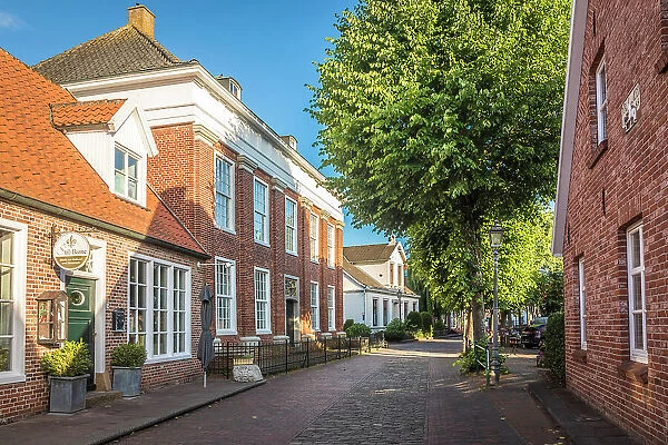 Historic brick houses in the old town of Greetsiel, East Frisia, Lower Saxony, Germany