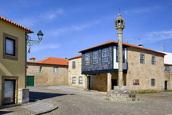 Historic center of Sernancelhe. The 16th century pillori and a beautiful medieval house. Sernancelhe, Beira Alta. Portugal