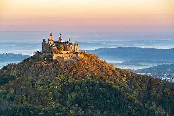 Hohenzollern castle in autumnal scenery at dawn. Hechingen, Baden-Wurttemberg, Germany
