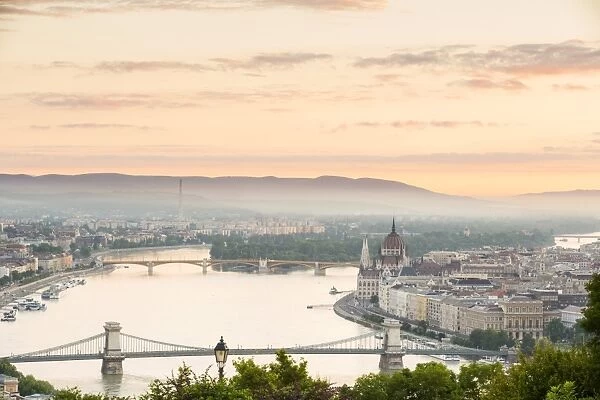 Hungary, Central Hungary, Budapest. Sunrise over Budapest and the Danube from Gellert